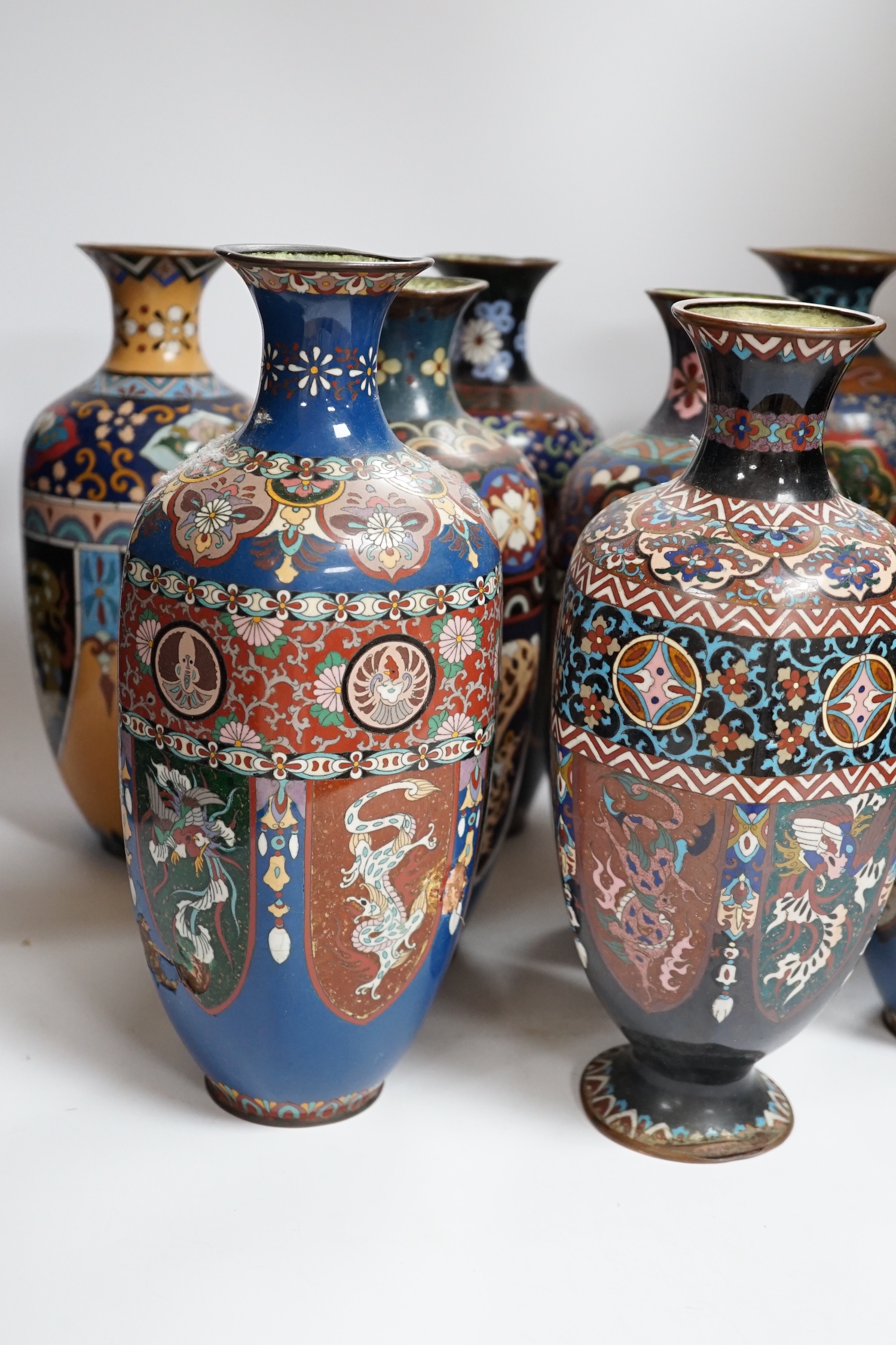 Eight Japanese cloisonné enamel vases, early 20th century, largest 30cm high